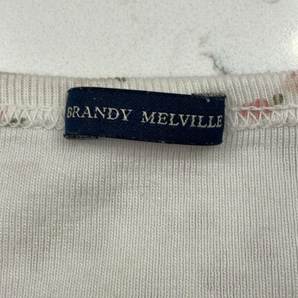 Brandy Melville pink and white flower button up top. - Picture 3 of 3